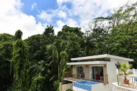 Moulin Kann Villas Hotels in Takamaka