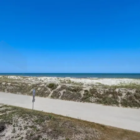 Dog Friendly Beachfront Condo, Direct Access to Beach by RedAwning