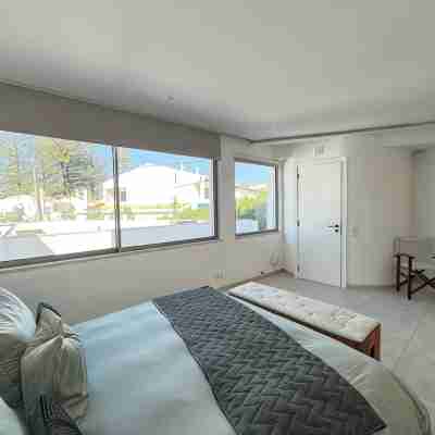 Luxury Villa Steps from the Beach | Heated Pool, Ocean Views & Rooftop Lounge Rooms