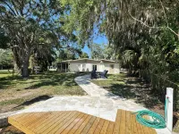 Indian Water Lodge is a waterfront retreat with Dockage, Kayaks, Bikes & More!