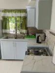 1 Modern A/C apartment with pool. Walking distance from beach, shop & restaurant