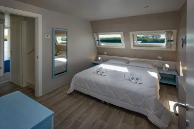Tranquil Marina Azzurra Resort House boat 2 camere da letto 6 posti letto Hotel in zona Ecopiazzola Comune di Sedegliano