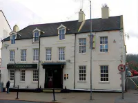 The County Hotel Hotels near Totem Poles