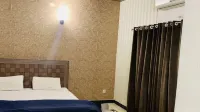 Homely Guest House Hôtels à : Rawalpindi Tehsil