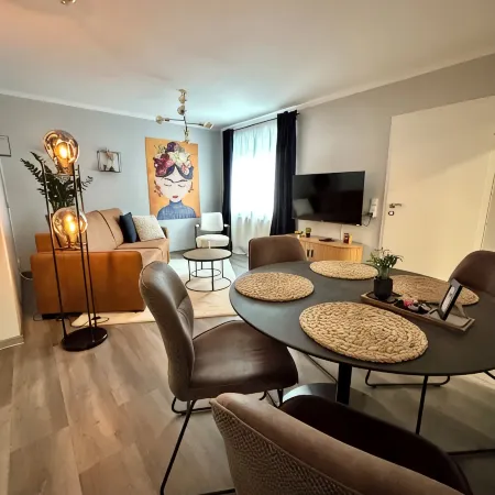 Stylish granny apartment with box-spring bed