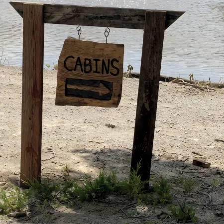 Big Mike's Cabin on the lake, next to ball diamonds nestled in 3 -cabin village