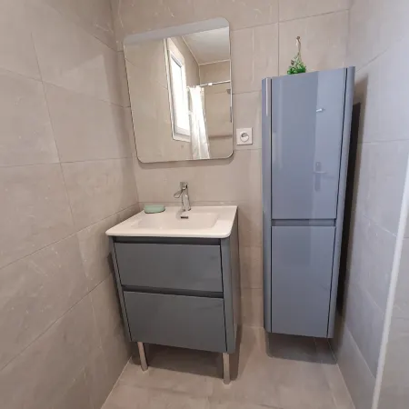 Apartment with balcony upstairs of a villa 300 m from the sea