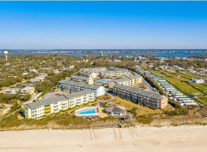Steps away from the Ocean,  Gym, Gazebos, Indoor/Outdoor  Pools, & Tennis Courts