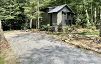 Nesthaven: A cozy boho-chic tiny home with a deck, fire pit, & nearby waterfall - 3-Star