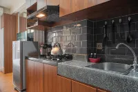 Relaxing and Homey Studio Transpark Cibubur Apartment By Travelio