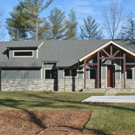 Lovely lakefront home with dock. Summertime stunner. Winter wonderland nearby.