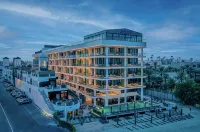 Arabella Beach Hotel Kuwait, Vignette Collection Hotels near Health Planet Supplement and Vitamin Shop