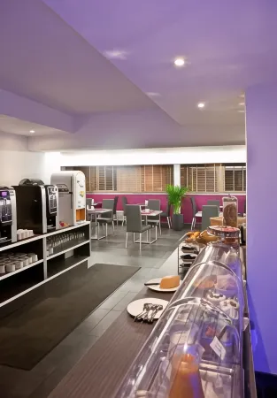 Privilège Hôtel & Apparts Eurociel Centre Comédie Отели рядом с достопримечательностью «Триумфальные ворота Пейру»