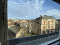 Large elegant apartment in the heart of Epernay. Quiet top floor with lovely view.