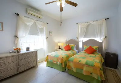 Welcome to the unpretentious and breezy Graceville, steps away from the beach Hotels near Gibbs Bay