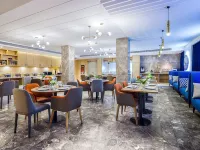 Kyriad Hotel (Weihai Xingfumen Weigao Square)
