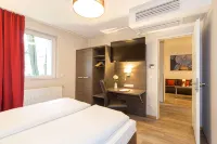 KOOS Hotel & Apartments - City Aparthotel - Condos