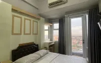 Apartemen VidaView by RoomForRent - balcony