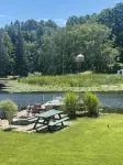 Cottage 3 is a charming 2 bedroom 25’ from your boat dock & Hamlin lake. - 2-Star