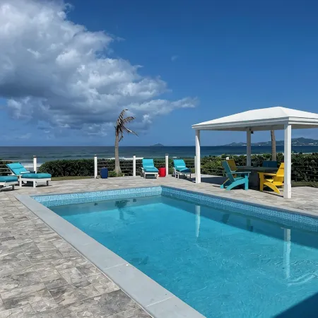 Wave Away!! A Gorgeous Beachfront Home with Private Pool!!
