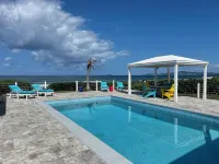 Wave Away!! A Gorgeous Beachfront Home with Private Pool!!