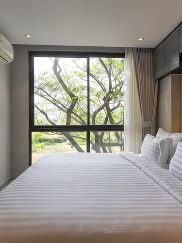 รูปภาพของ*Best Stay Near Beach | Full Amenities Condo C33
