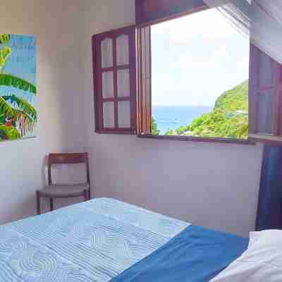 Up there in the garden - Villa with sea and mountain views - Deshaies Rooms