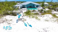 Luxurious 5000 sq ft Beachfront Villa ON TROPIC OF CANCER BEACH Отели в г. 