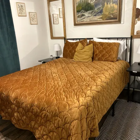 Near Kansas City Area Cottage with a Fire Pit! Comfy Beds and a Stocked Kitchen.