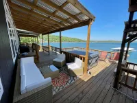 AMAZING WATERFRONT HOME WITH HOT TUB. BOTH HAVE EXTENSIVE VIEWS OF THE LAKE - 4-Star