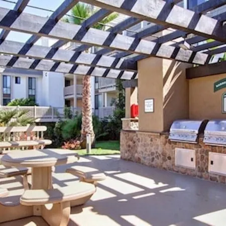 Beautiful End Unit Single Level Condo North Coast Village - Walk to the beach!!