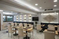 哈爾瑪精品酒店 - 早餐