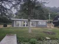 Charming Lakefront Retreat on Little Mill Lake Hotels in Barry County