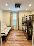Charming Mountain-View Waterfront Retreat – Hot Tub, Sauna, Game Room & Fire Pit