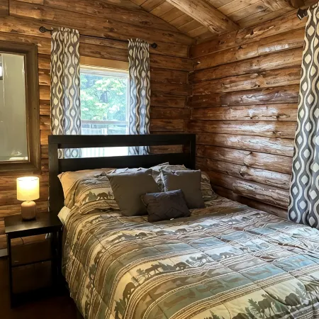 Beautiful private beach area within steps from the modern updated log home