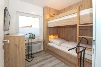 Ferienhaus Dünentraum II: Helles Reihenhaus für 4 Personen + Baby - Wi-Fi