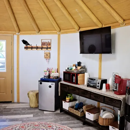 Fanciful mountainside yurt with private bathhouse