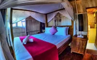 Cosmos Bungalows Hotel dekat KOLAM RENANG MILANO PALANGISANG