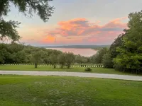 The Stone Schoolhouse - Gated Lakefront Acreage with views and historic charm