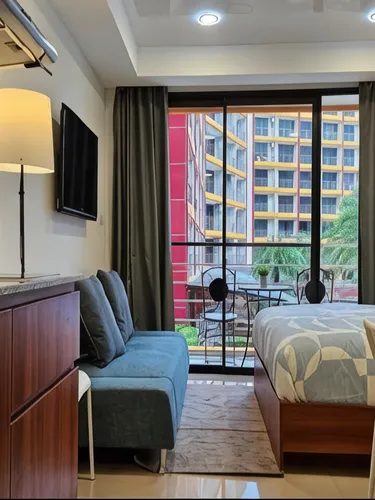 รูปภาพของอพาร์ทเมนต์ Thai Studio Condotel 777 ตั้งอยู่ติดกับชายหาดที่ยาวที่สุดและสะอาดที่สุด