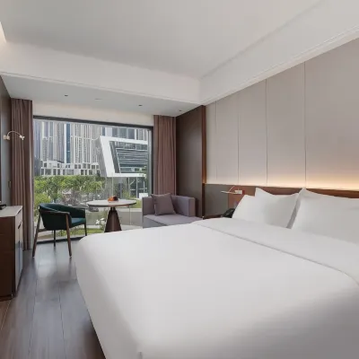 Ridesheng Light Luxury Inn (Haikou West Bus Station) Отели рядом с достопримечательностью «Пляж Jiari»