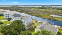 Soundfront, private dock, neighborhood pool, beach access, and tennis, Sunsets - Homestays