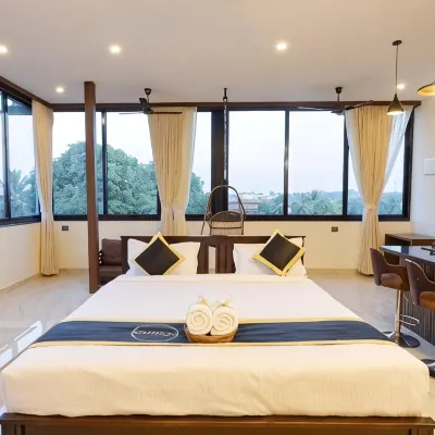 Reunion De Homes - Premium Suites Hotels near Adarsh Complex