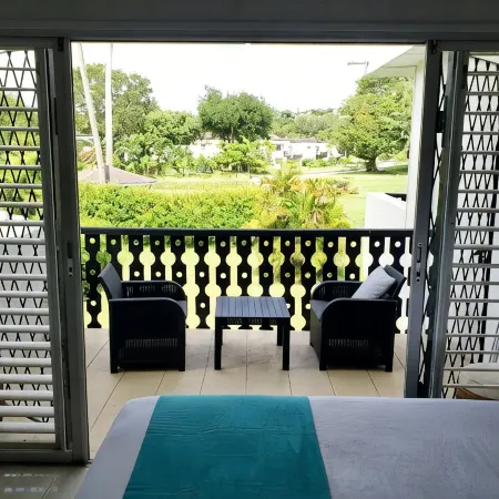 Peaceful intensely clean unit overlooking tropical gardens and golf course