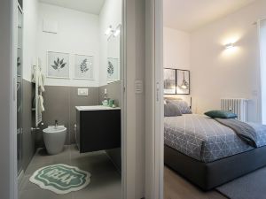 "charming and Modern Three-Bedroom Apartment in the Heart of the City of Asti."