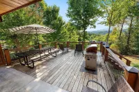 Kim's Cove Motorcycle-Friendly Cabin Features Game Room by RedAwning