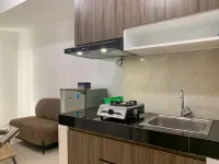 Homey and Simply 2BR at Serpong Garden Apartment By Travelio