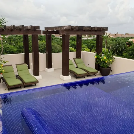 Charming 2-bedroom condo with WiFi, AC in wonderful Puerto Aventuras