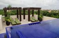 Charming 2-bedroom condo with WiFi, AC in wonderful Puerto Aventuras