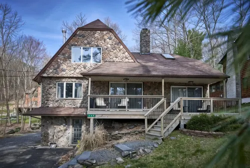 Fire Pit, Babbling Brook, Poker & Foosball at this 3br+ home - 3-Star